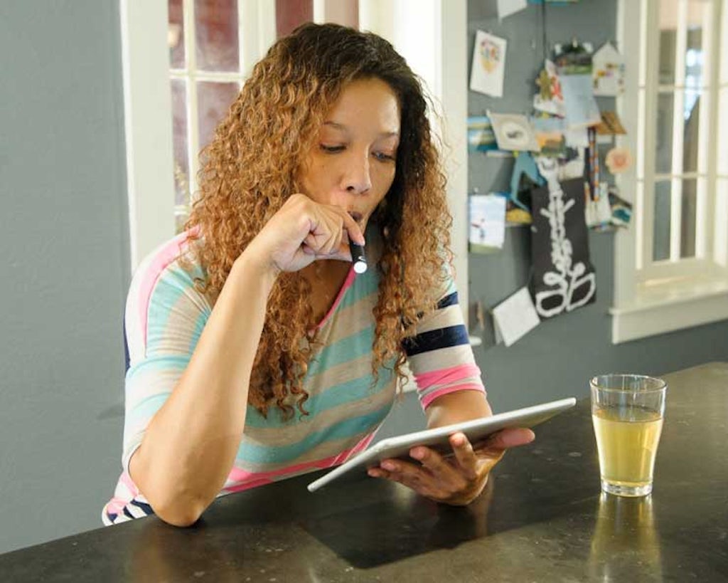 Woman vaping marijuana