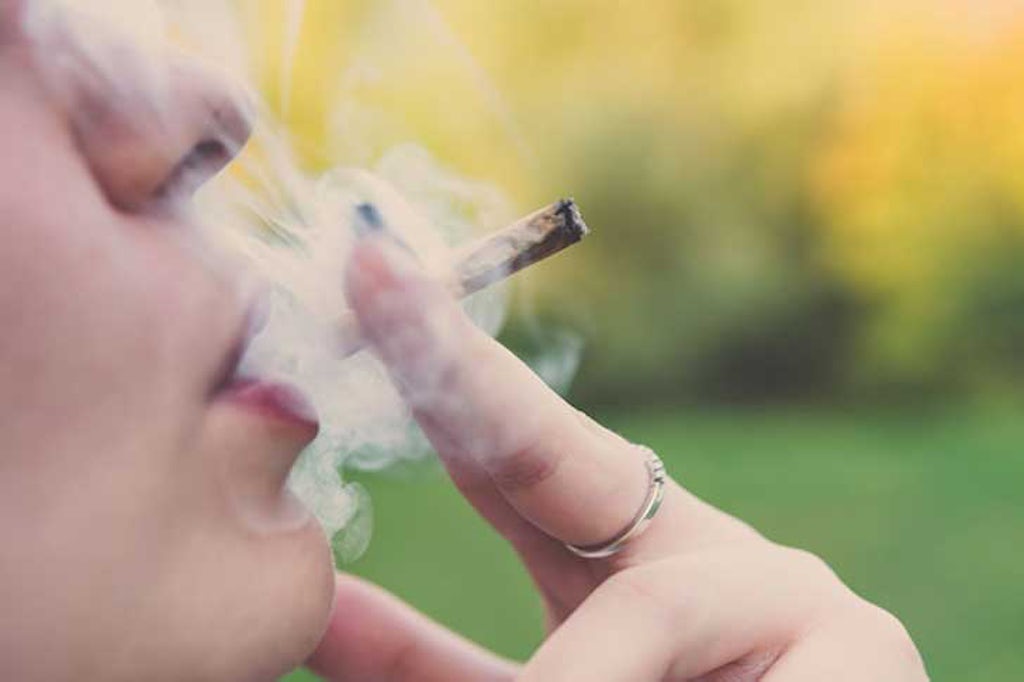 Woman smoking marijuana
